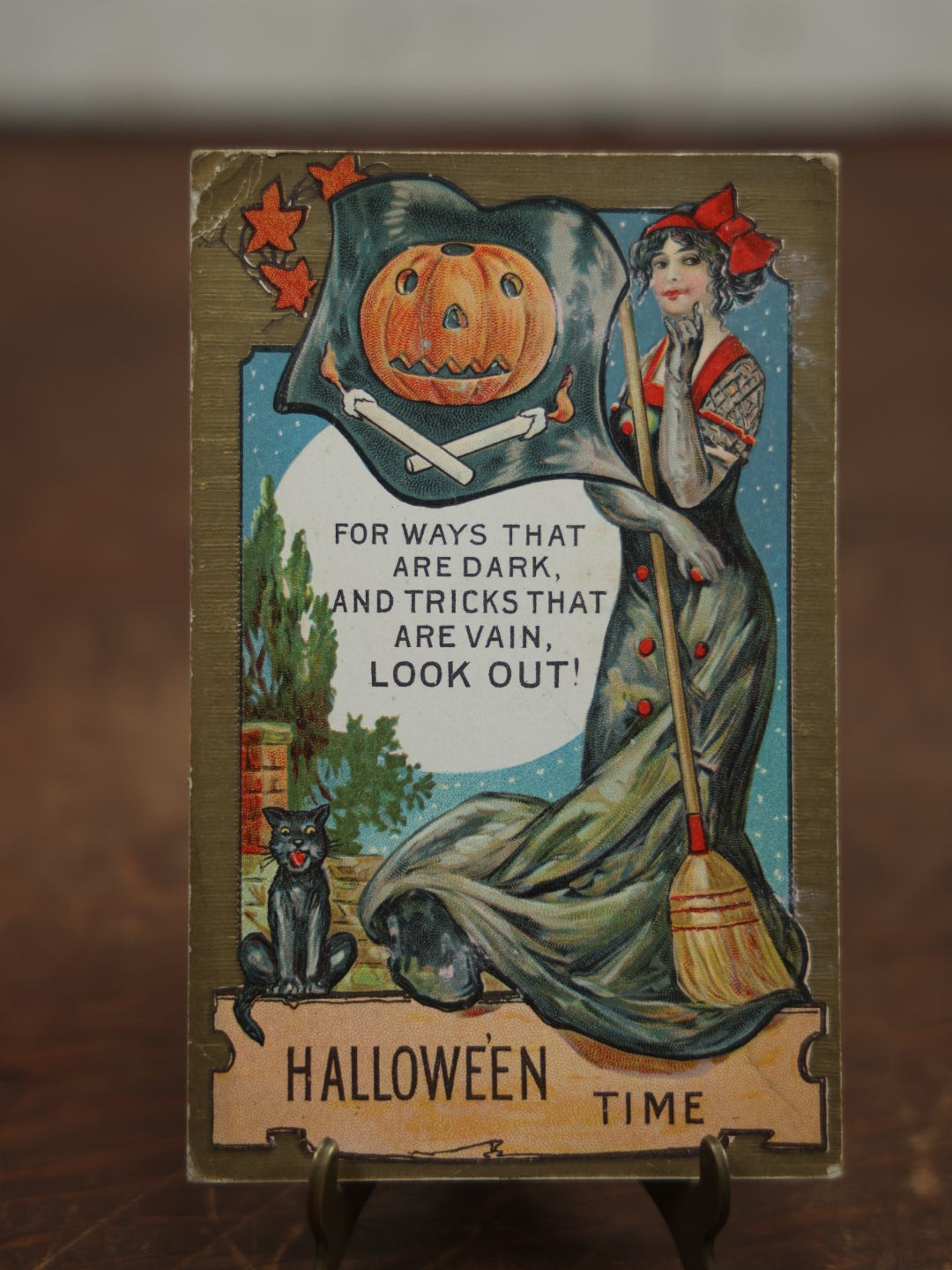 Lot 032 - Antique Embossed Halloween Postcard, Pretty Woman With Red Bow And Broom, Jack-O-Lantern Pumpkin Flag, Black Cat, "Halloween Time," Postmarked 1913, Writing