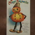 Lot 033 - Antique Embossed Halloween Postcard, Pumpkin Jack-O-Lantern Man, By Ellen Clapsaddle, "A Merry Halloween," Postmarked 1915, Printed In Germany, International Art Publishing Company, Series No. 1667