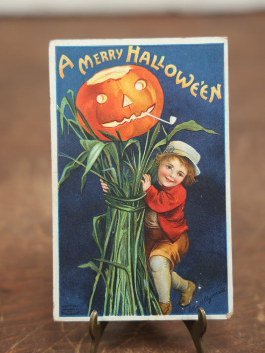 Lot 034 - Antique Embossed Halloween Postcard, Child On Stalk With Jack-O-Lantern Pumpkin, By Ellen Clapsaddle, "A Merry Halloween," Writing, Printed In Germany, International Art Publishing Company, Series No. 978