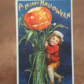 Lot 034 - Antique Embossed Halloween Postcard, Child On Stalk With Jack-O-Lantern Pumpkin, By Ellen Clapsaddle, "A Merry Halloween," Writing, Printed In Germany, International Art Publishing Company, Series No. 978