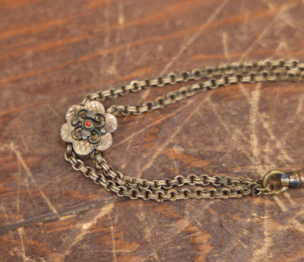 Lot 051 - Antique Watch Chain With Charms Including Square Monogrammed B Locket, Glass Windowed Piece