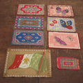 Lot 067 - Grouping Of Eight Antique Tobacco Felts Including Mexican Flag, Butterflies, Patterns, Varying Sizes