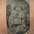Lot 085 - Antique Single Tintype Photograph Of A Painting Depicting Two Young Lovers Flirting, Tinted Flowers