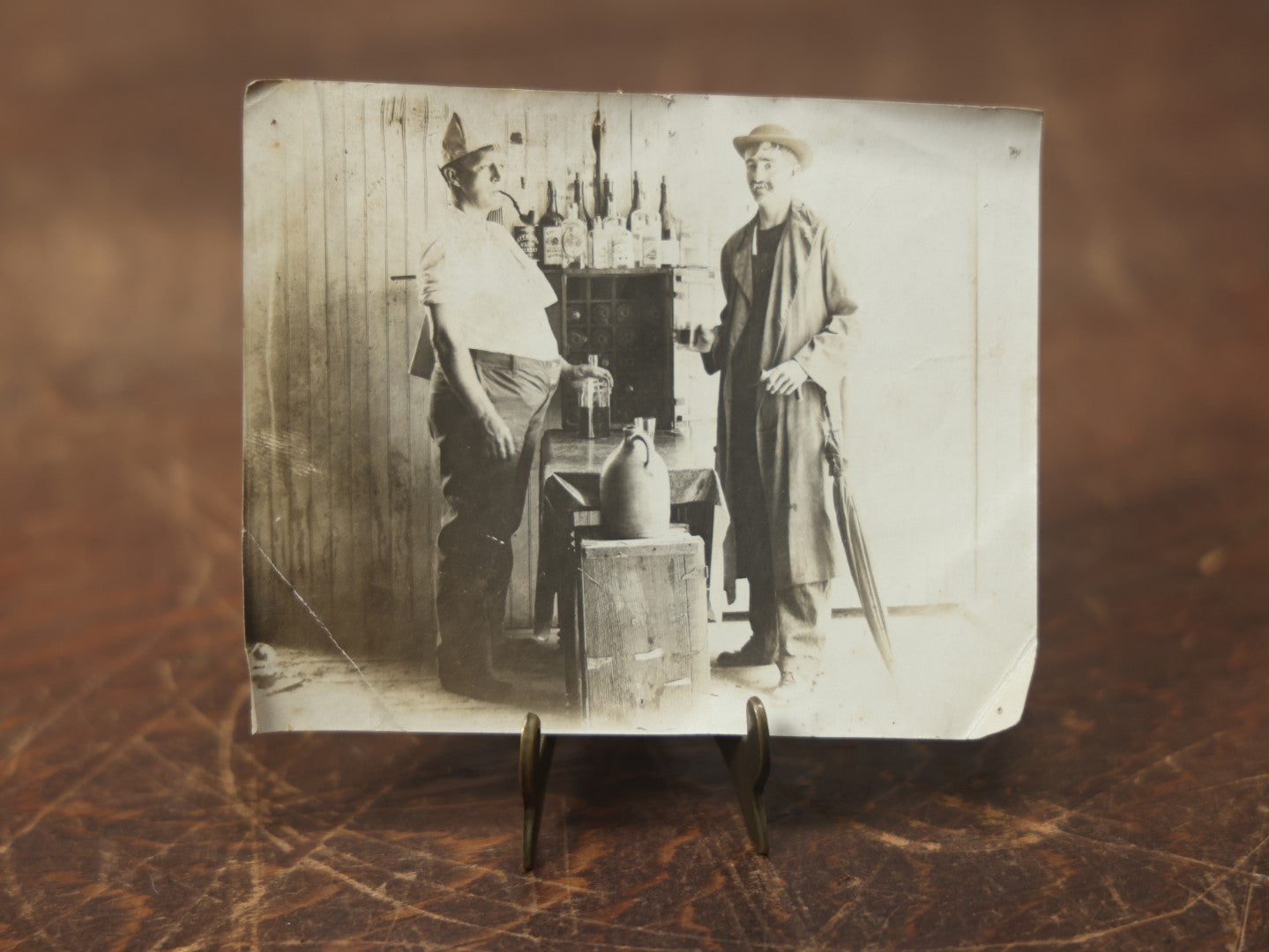 Lot 091 - Single Antique Snapshot Photo Of Two Men And Their Whiskey Collection, Drinking