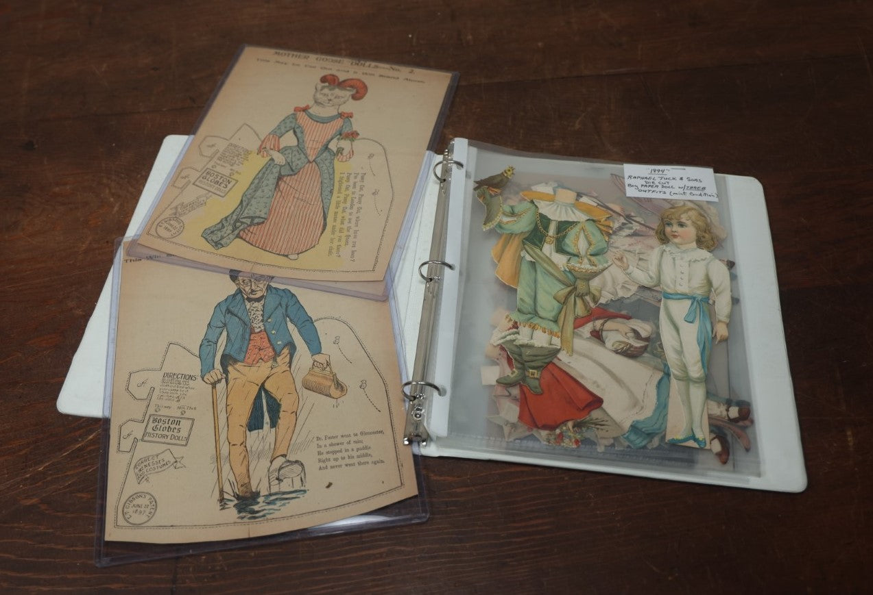 Lot 102 - Large Grouping Of Paper Dolls In Binder, Including Dolls And Outfits By Raphael Tuck & Sons