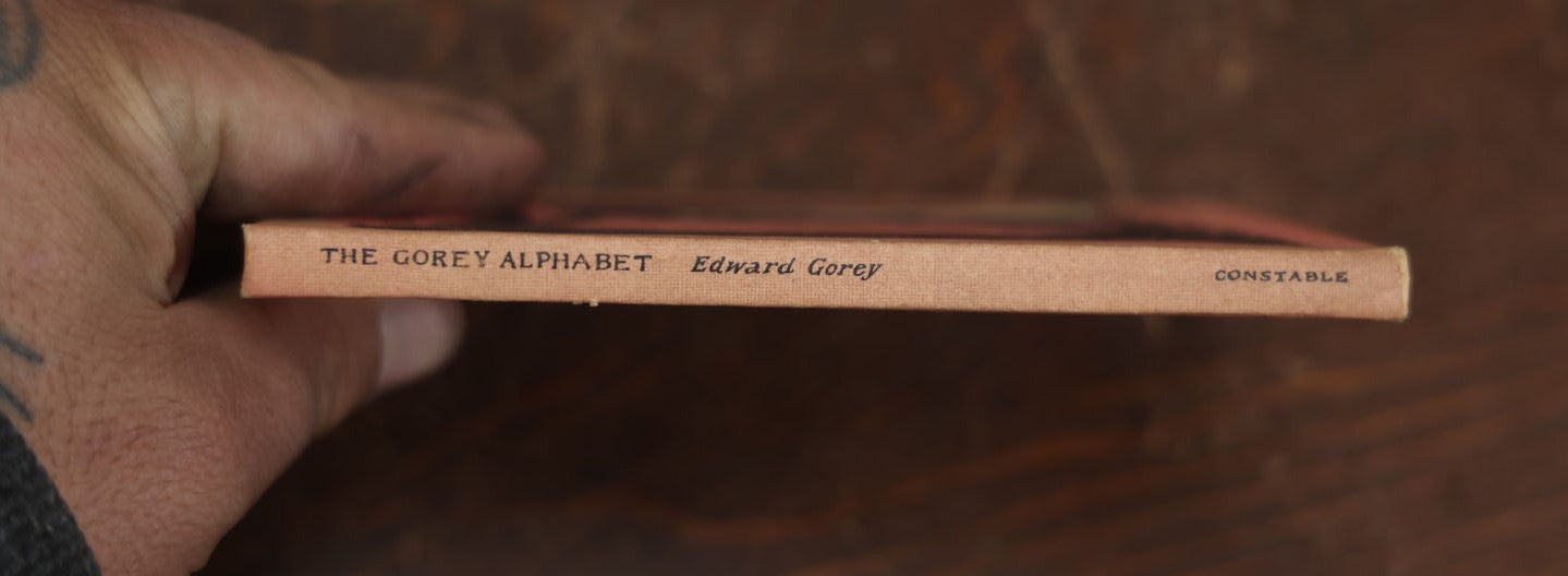 Lot 008 - "The Gorey Alphabet" Written And Illustrated By Edward Gorey, Constable Publication, 1961, With Note And Tipped In Illustration From Unknown Author And Illustrator Jon E. "Eddy" Lindstrom To His Sister