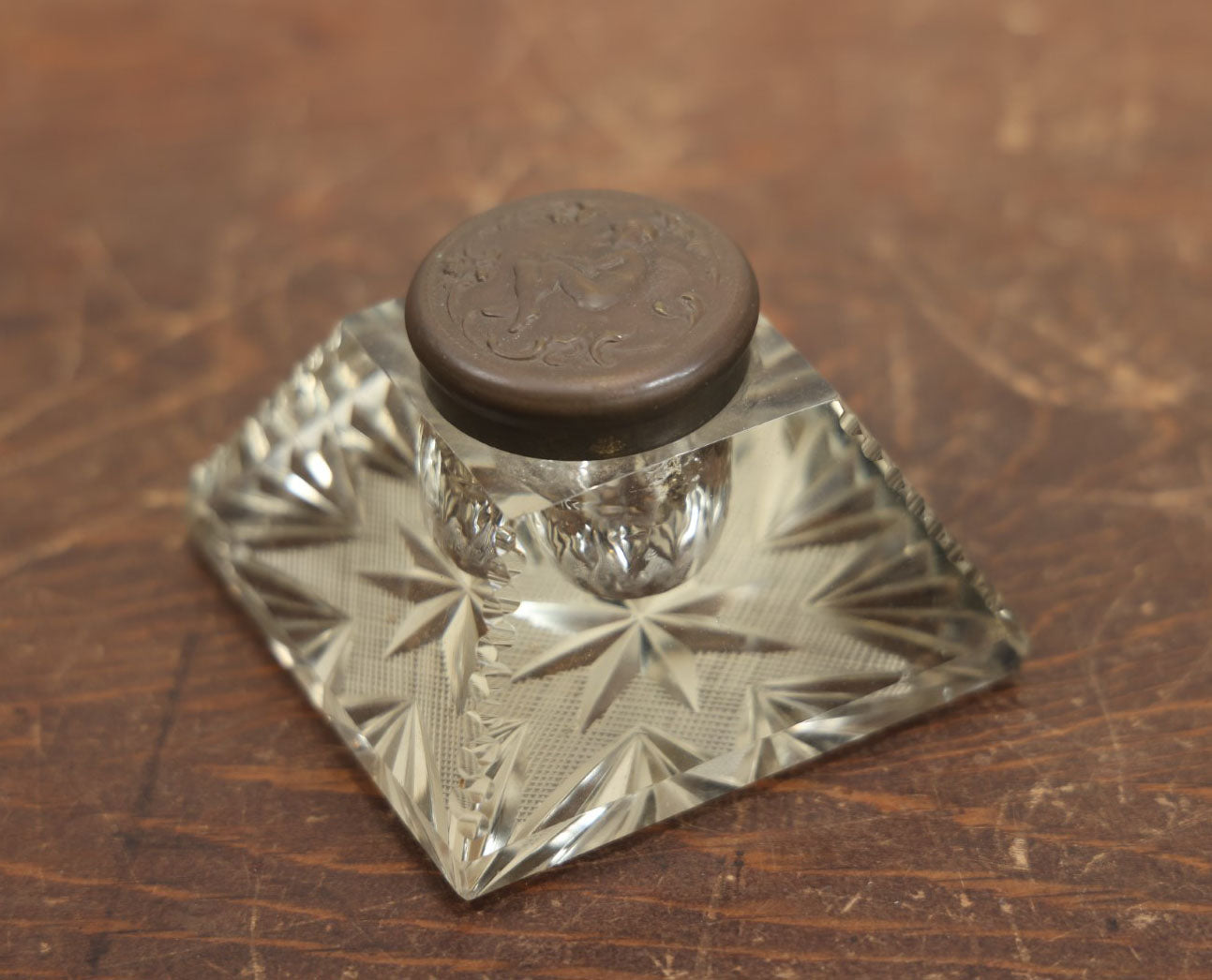 Lot 019 - Antique Cut Glass Inkwell With Brass Cherub Lift Off Lid, Note Various Chipping