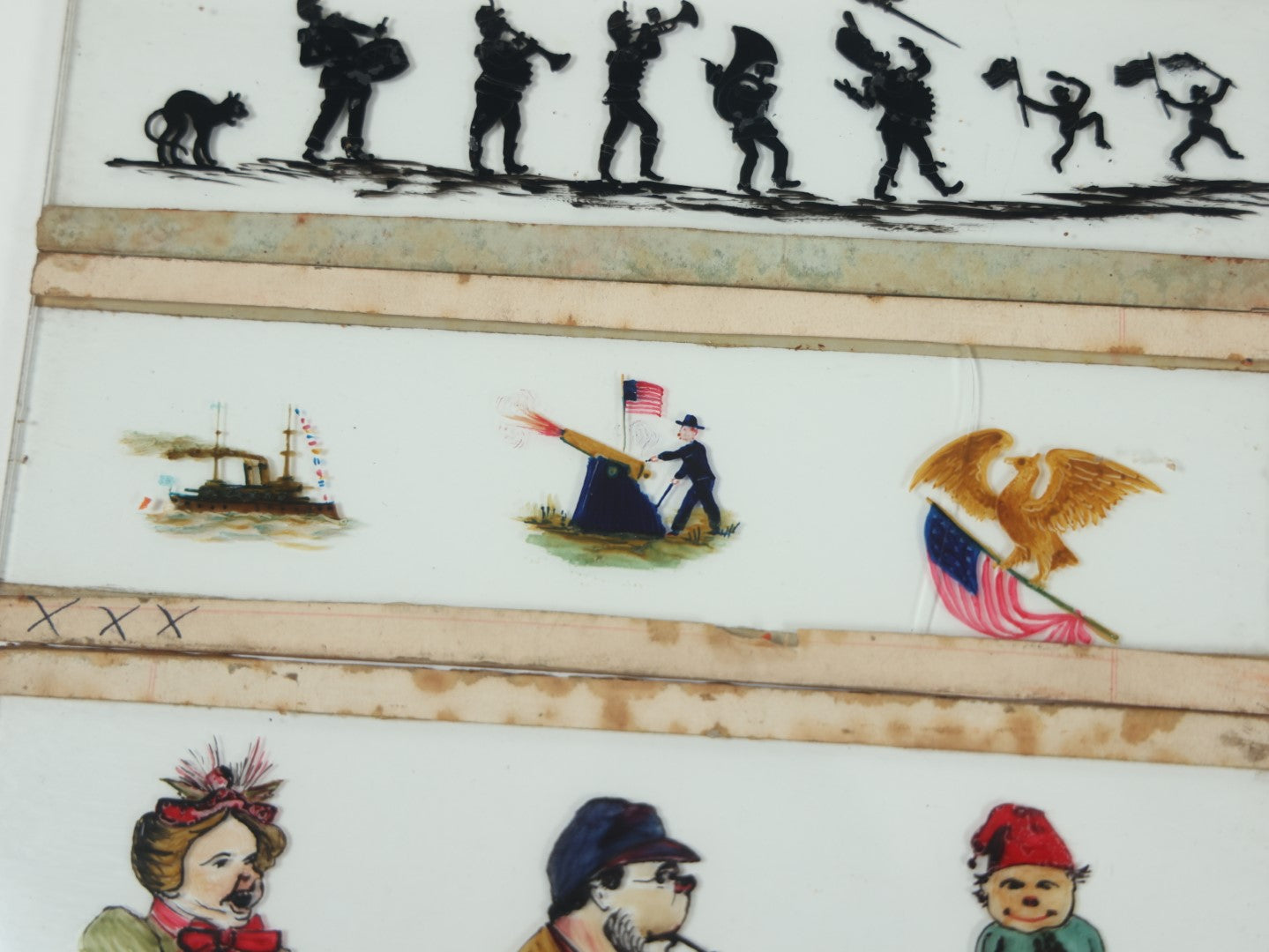 Lot 026 - Grouping Of Five Antique Hand Painted Magic Lantern Slides Including American Flag, Spanish American War Related, Admiral Dewey, Characters, And Silhouettes, Circa 1900