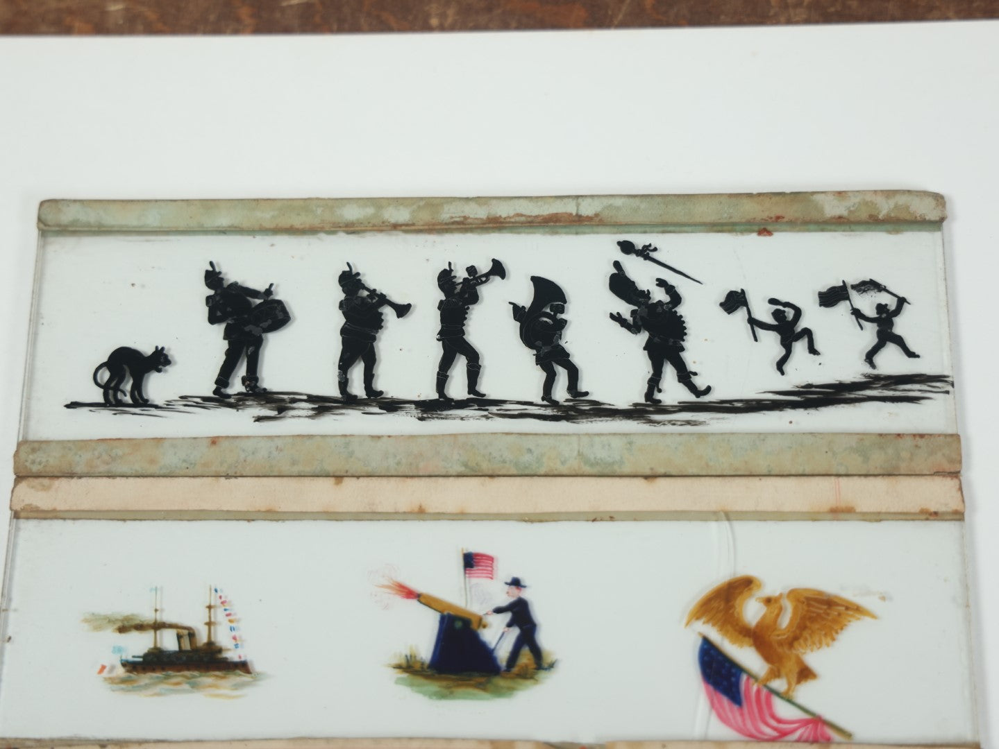 Lot 026 - Grouping Of Five Antique Hand Painted Magic Lantern Slides Including American Flag, Spanish American War Related, Admiral Dewey, Characters, And Silhouettes, Circa 1900