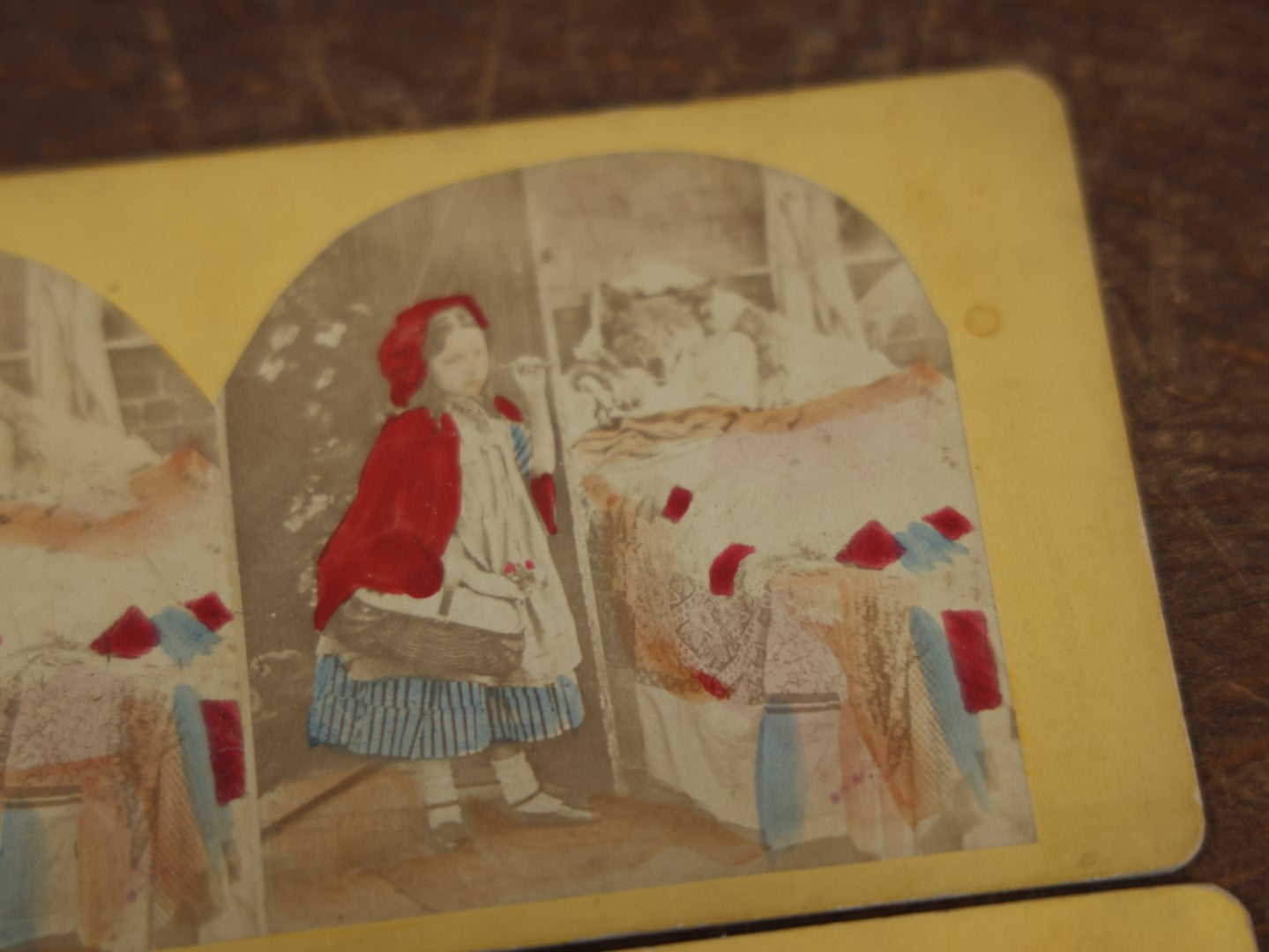 Lot 031 - Grouping Of Three Antique Stereograph Cards Of Little Red Riding Hood, From The Same Series, Featuring Taxidermy Big Bad Wolf Mount, Hand Colored