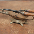 Lot 033 - Antique Cast Iron Gas Curling Iron Heater With Figural Turtle Base, Including Antique Curling Iron With Wood Handles