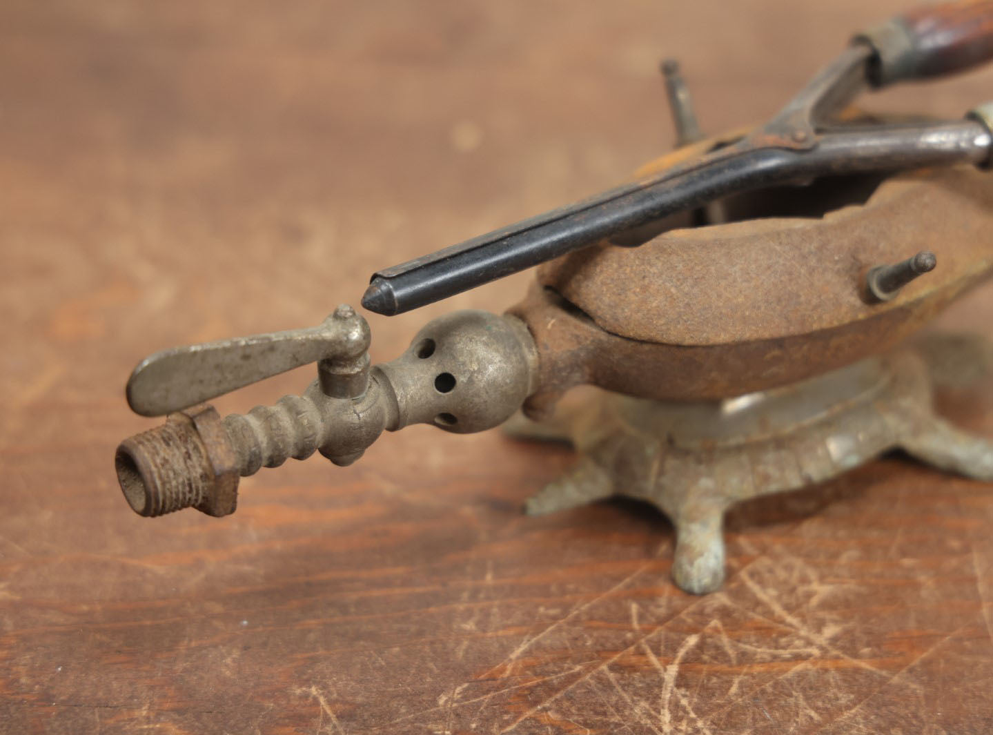 Lot 033 - Antique Cast Iron Gas Curling Iron Heater With Figural Turtle Base, Including Antique Curling Iron With Wood Handles