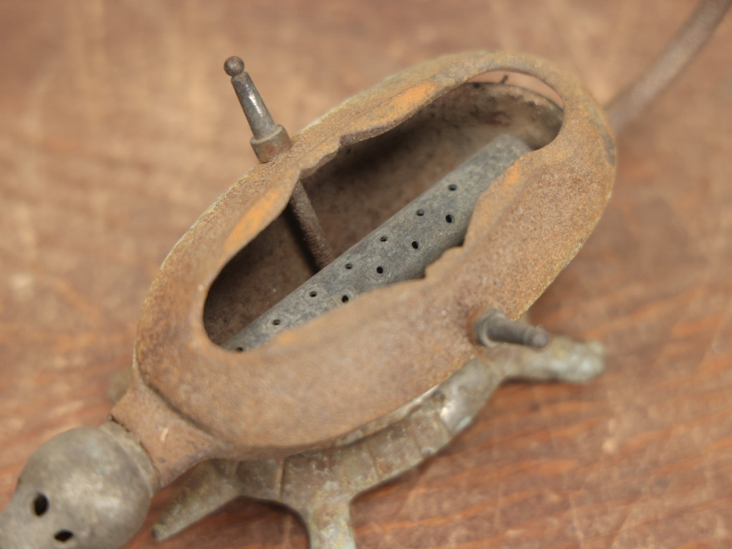 Lot 033 - Antique Cast Iron Gas Curling Iron Heater With Figural Turtle Base, Including Antique Curling Iron With Wood Handles