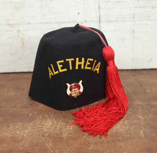 Lot 048 - Vintage Aletheia Shriners Masonic Fraternal Black Fez With Red Tassle, Genuine Leather Band, Made By Lou-Walt Corp, New York, New York , Size 6-3/4