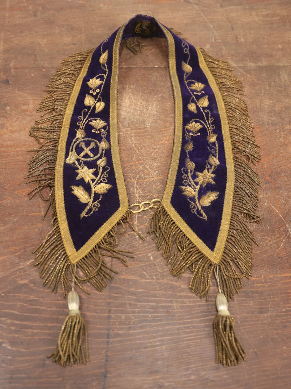 Lot 052 - Vintage Purple Velvet Odd Fellows I.O.O.F. Sash Collar With Vine And Leaves, Crossed Staffs Symbol, Tassels, By Harding Army And Navy Uniforms, Boston, Massachusetts