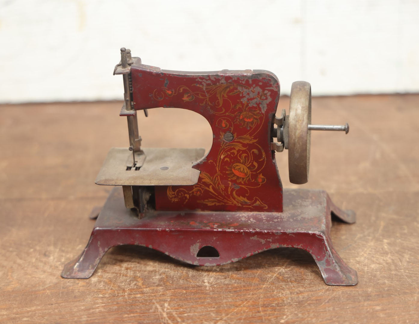 Lot 054 - Vintage Tin Lithograph Children's Miniature Sewing Machine, Red, Likely Made In Germany