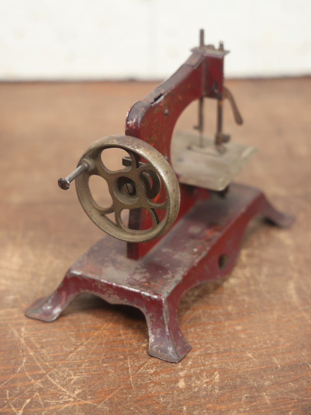 Lot 054 - Vintage Tin Lithograph Children's Miniature Sewing Machine, Red, Likely Made In Germany