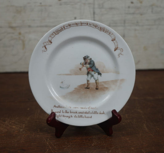 Lot 063 - Antique Novelty Nursery Rhyme Plate, A Little Man Shooting A Little Duck Right Through Its Little Head, Royal Doulton, England