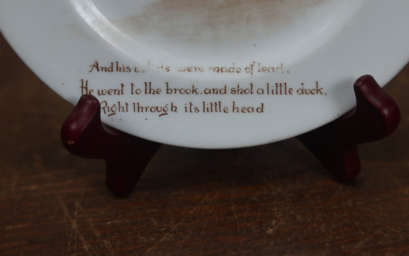 Lot 063 - Antique Novelty Nursery Rhyme Plate, A Little Man Shooting A Little Duck Right Through Its Little Head, Royal Doulton, England