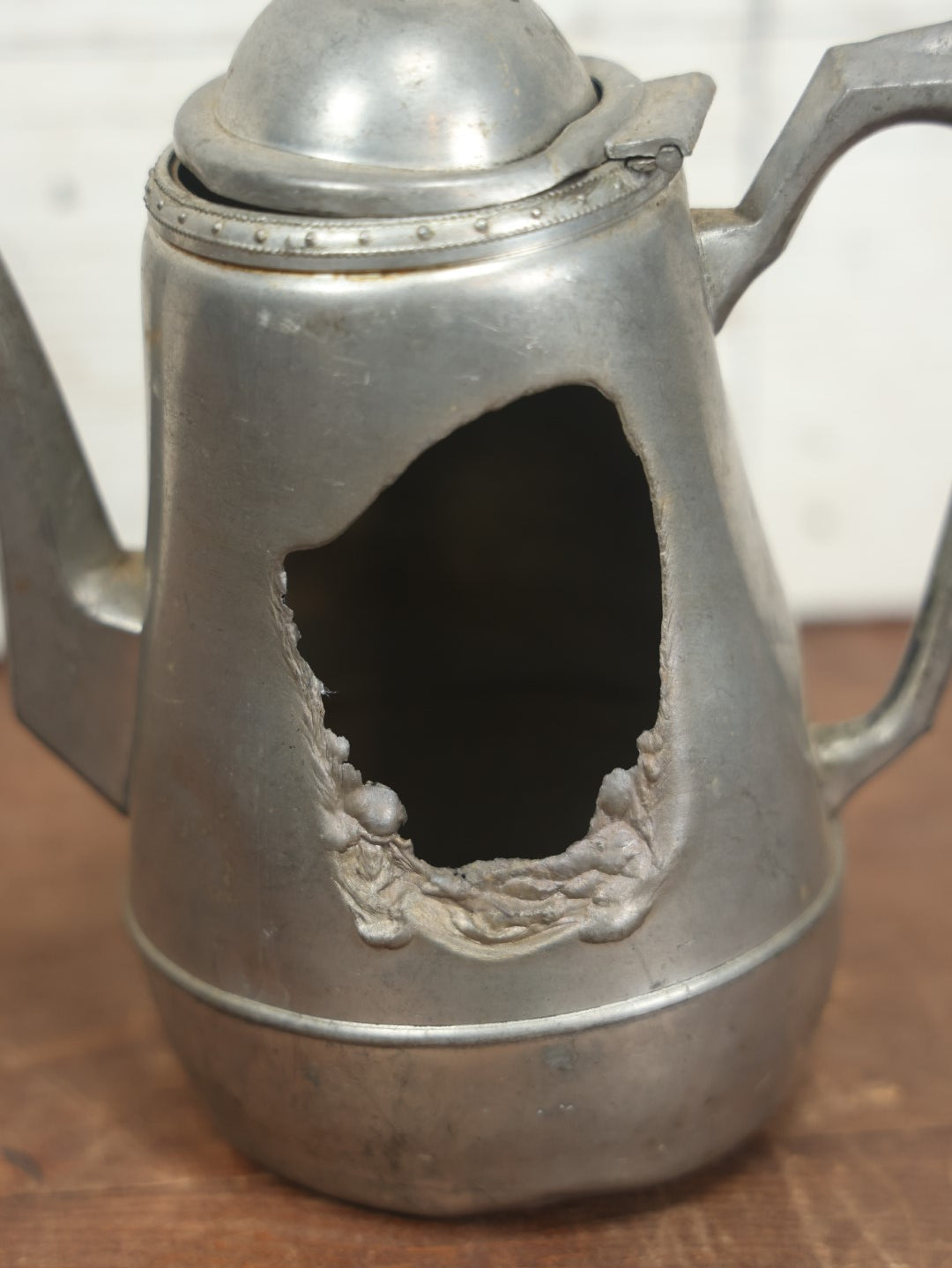 Lot 075 - Antique Pewter Pitcher With Melted Side And Note Indicating A Previous Owner Set It Too Close To The Stove