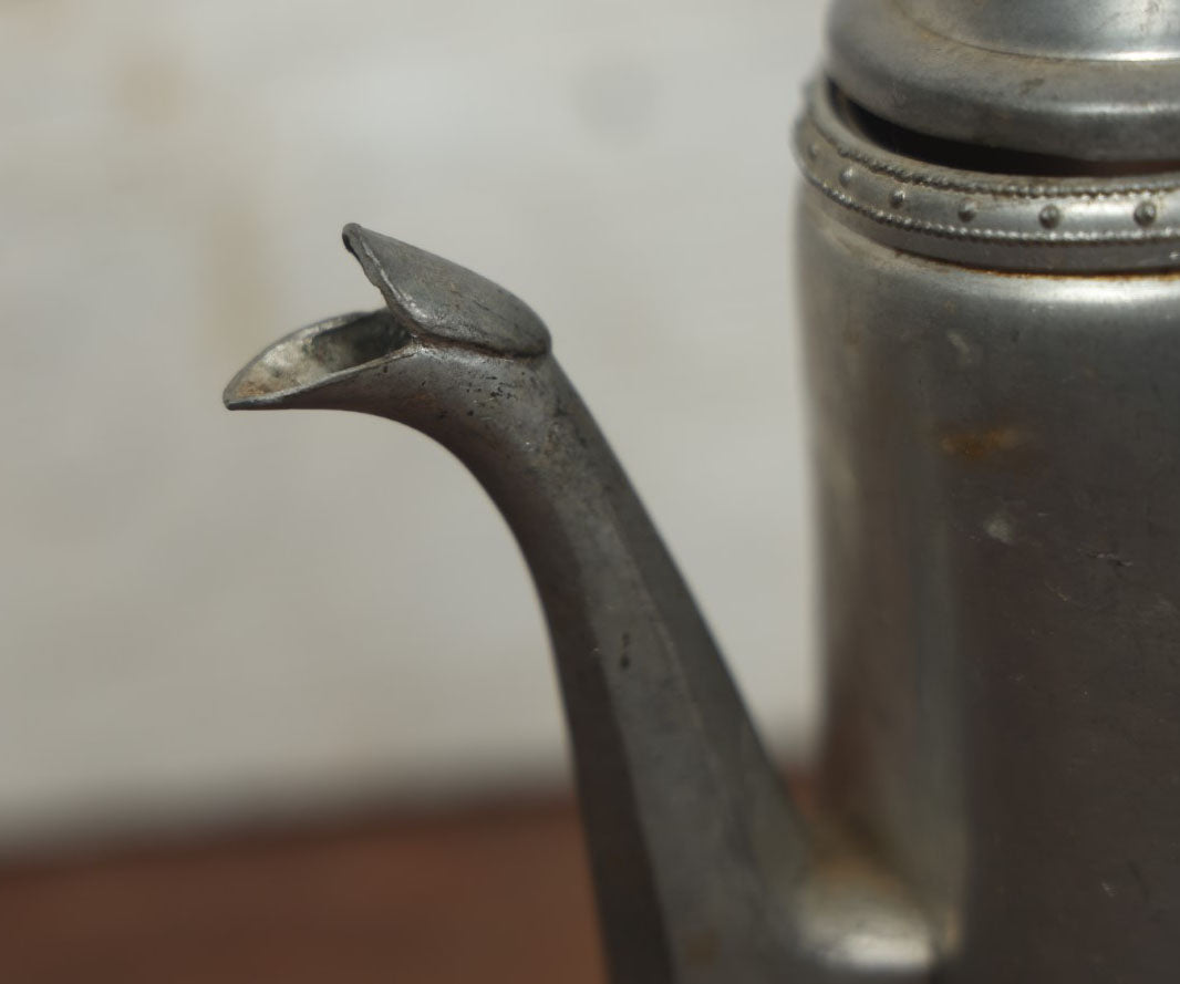 Lot 075 - Antique Pewter Pitcher With Melted Side And Note Indicating A Previous Owner Set It Too Close To The Stove