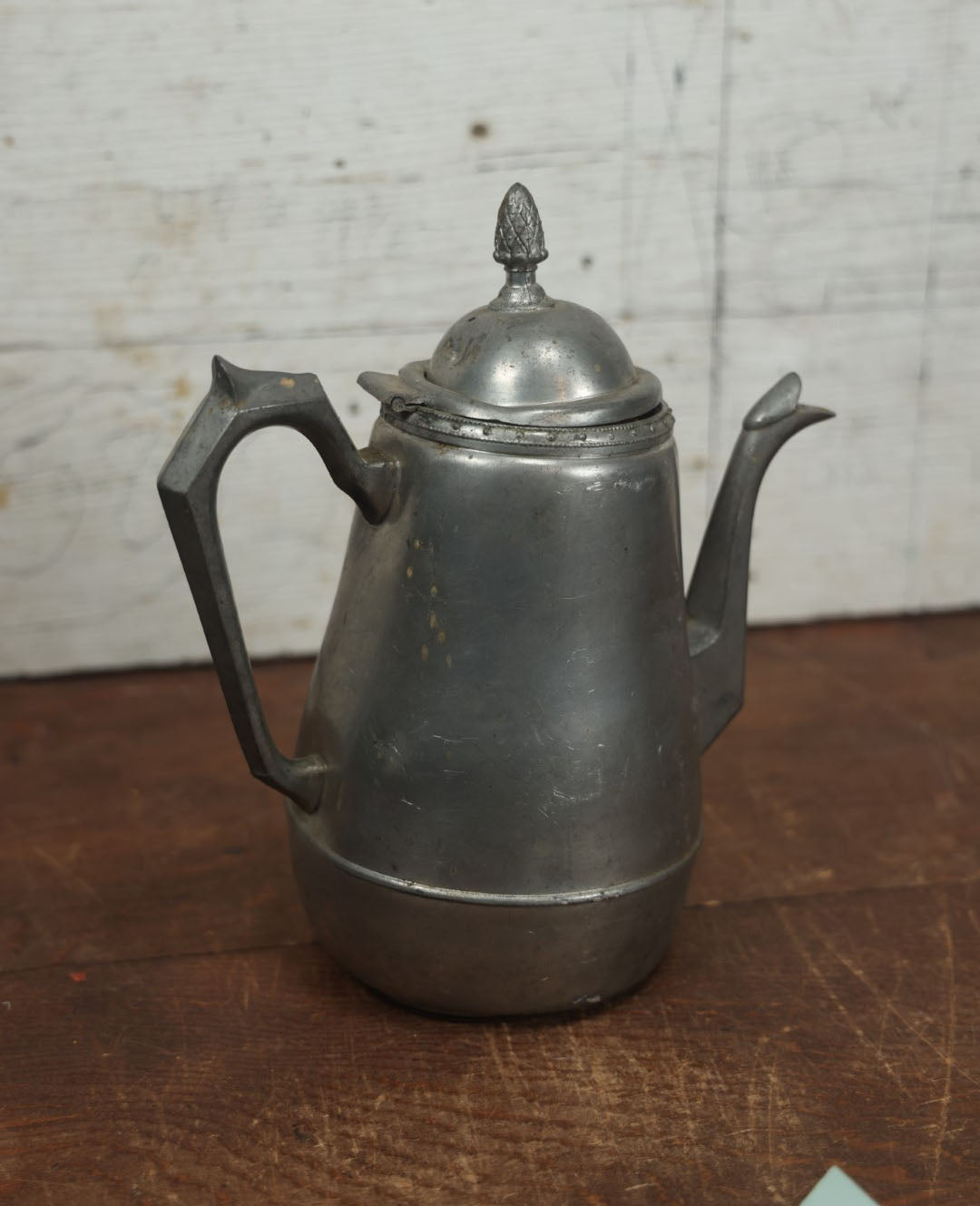 Lot 075 - Antique Pewter Pitcher With Melted Side And Note Indicating A Previous Owner Set It Too Close To The Stove