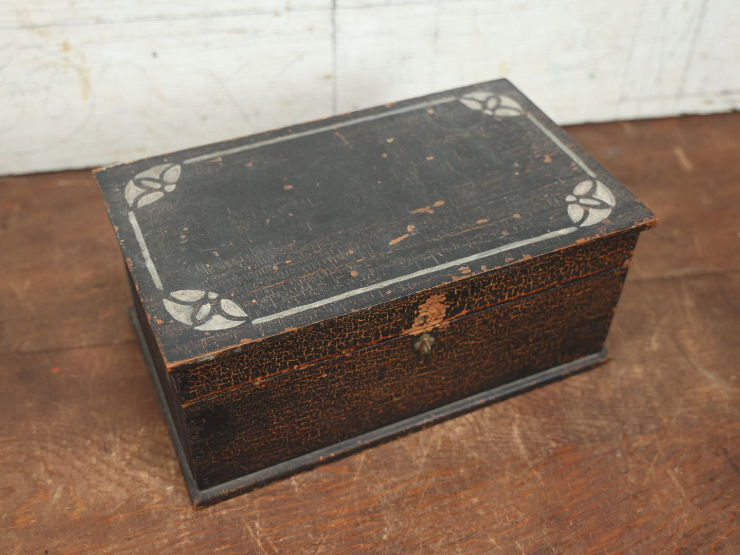 Lot 080 - Antique Black Painted And Stenciled Wooden Storage Box With Hinged Lid