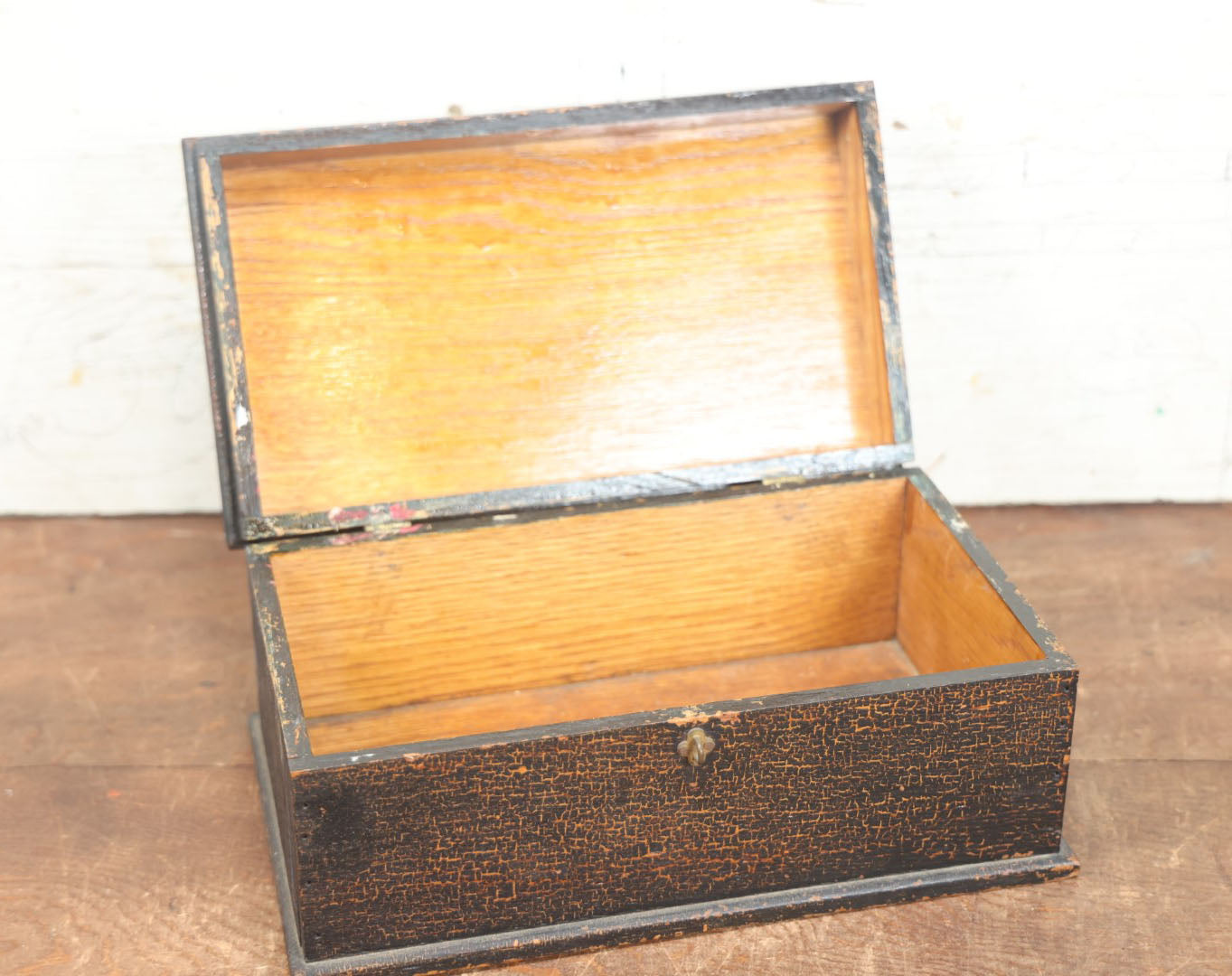 Lot 080 - Antique Black Painted And Stenciled Wooden Storage Box With Hinged Lid