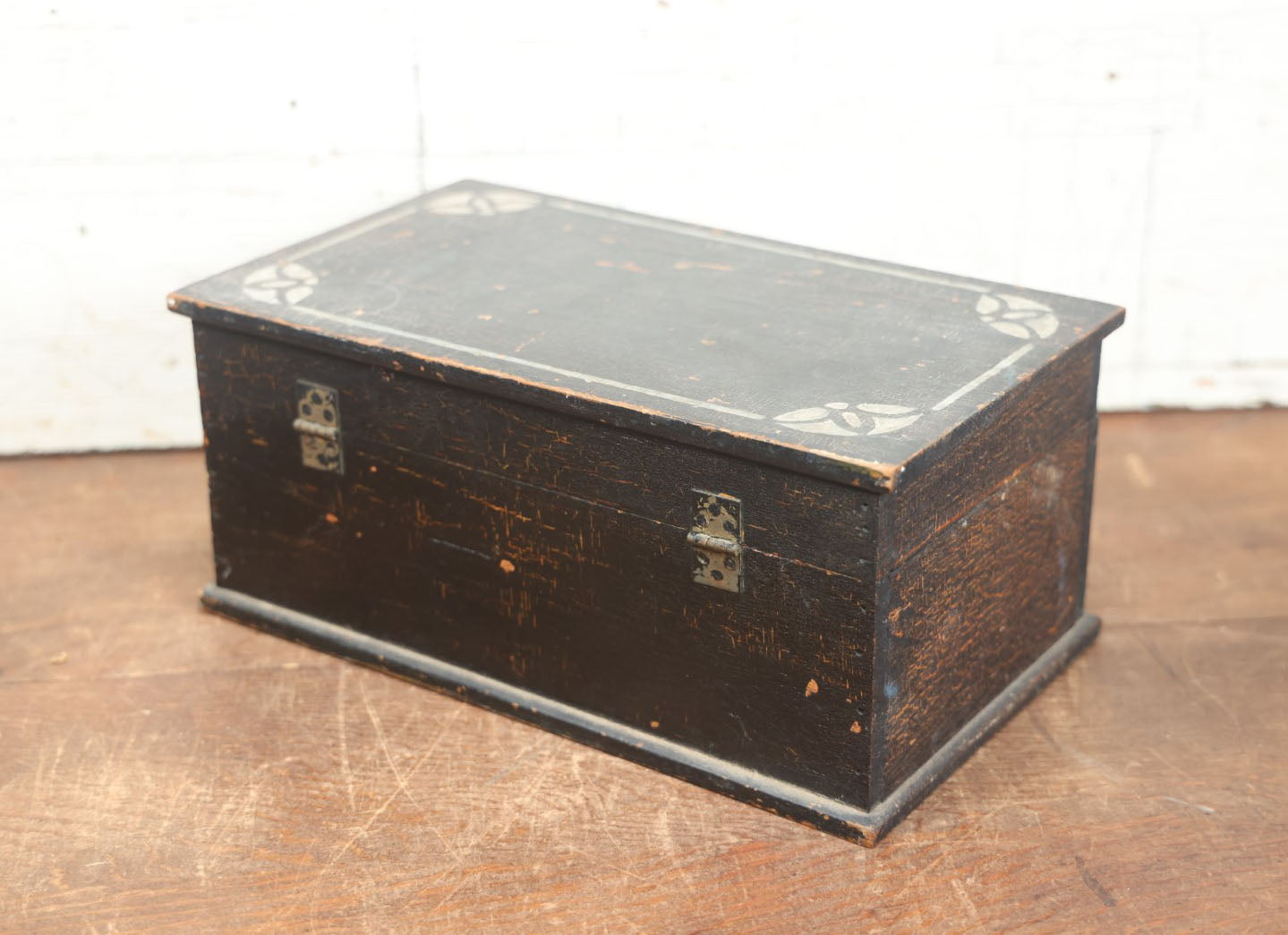 Lot 080 - Antique Black Painted And Stenciled Wooden Storage Box With Hinged Lid