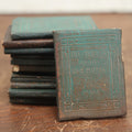 Lot 090 - Grouping Of Twelve Antique Miniature Library Books, Green Group, Including Edgar Allan Poe's "Murders In Rue Morgue,"  "The Sidewalks Of New York," Henrik Ibsen's "Ghosts" And More