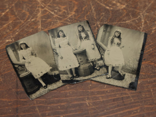 Lot 096 - Grouping Of Three Antique Tintypes Depicting The Same Two Girls, Possibly On First Communion