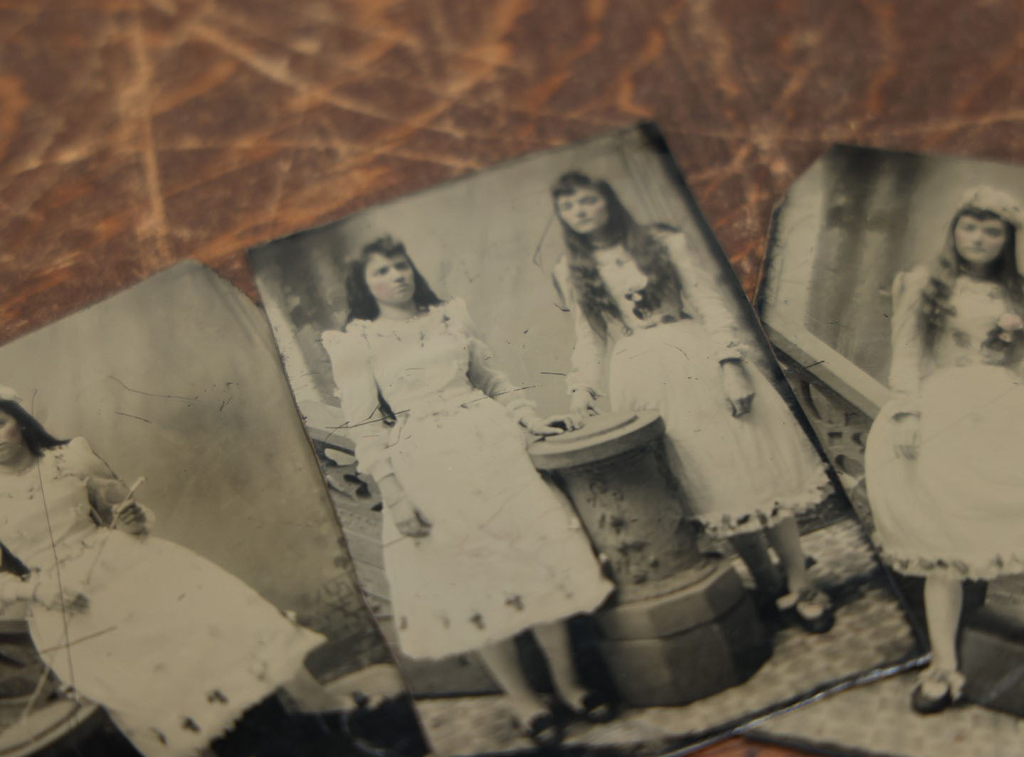 Lot 096 - Grouping Of Three Antique Tintypes Depicting The Same Two Girls, Possibly On First Communion