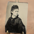 Lot 098 - Antique Tintype Photograph Of Pretty Woman Looking To Left With Cross Necklace, Dark Clothing