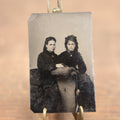 Lot 099 - Antique Tintype Photograph Of Two Pretty Young Women, One With Large Hair, Necklaces, Sitting On Chair