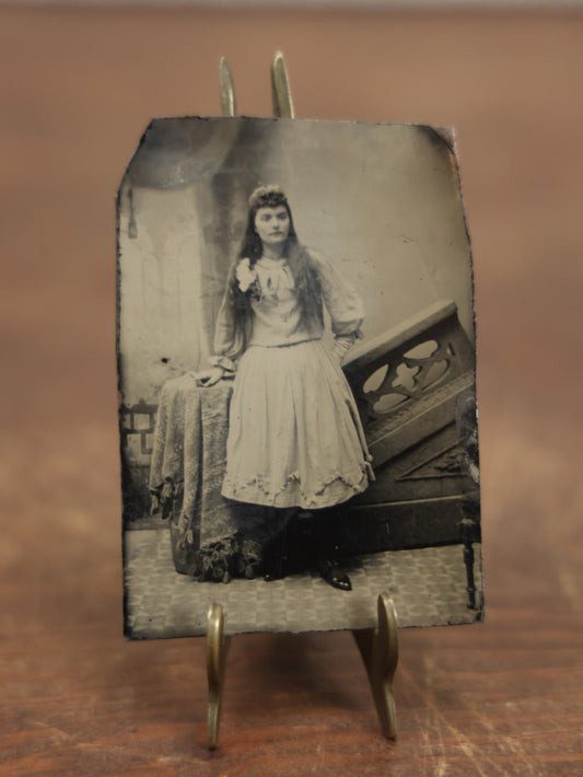 Lot 103 - Antique Tintype Photo Of Young Woman With Very Long Hair, Long Light Colored Dress, Unique Studio Set Pieces