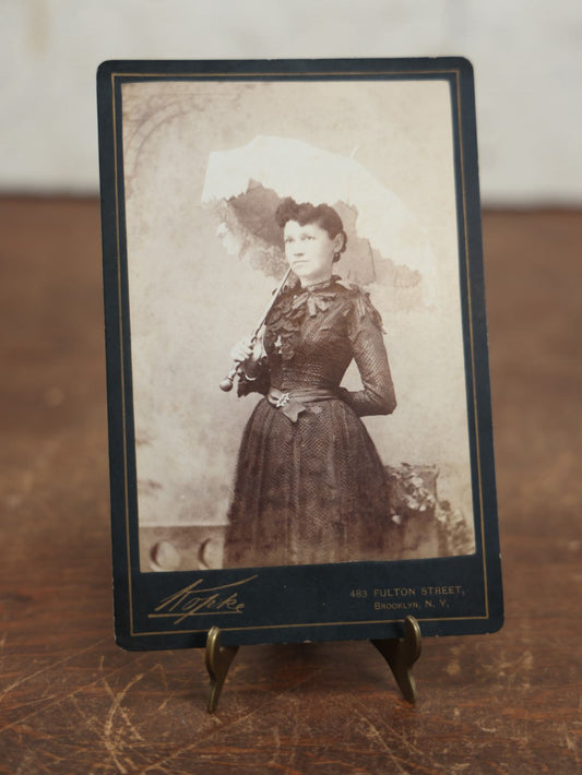 Lot 108 - Antique Cabinet Card Photo Of Extravagantly Dressed Woman With White Parasol