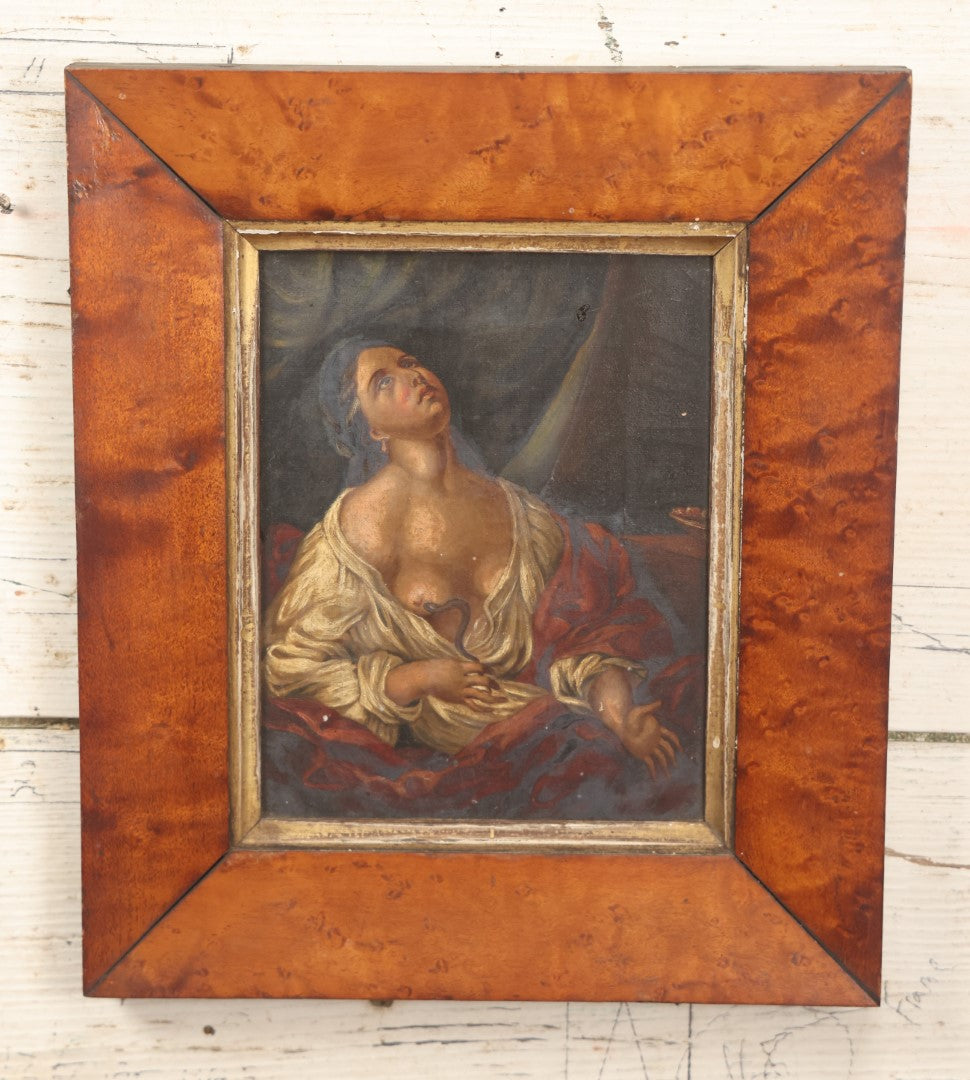 Lot 008 - 19th Century Oil On Canvas Painting Of Cleopatra With The Asp, Suicide And Death, After After Guido Reni (Italian, 1575-1642), In Birdseye Maple Frame