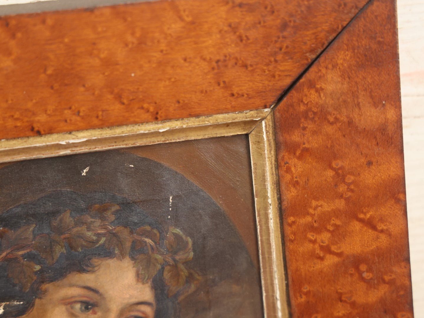 Lot 009 - 19th Century Oil On Canvas Painting Depicting A Woman In A Laurel Crown With Grapes, Likely After Another Work, Greek Or Roman Goddess, In Birdseye Maple Frame