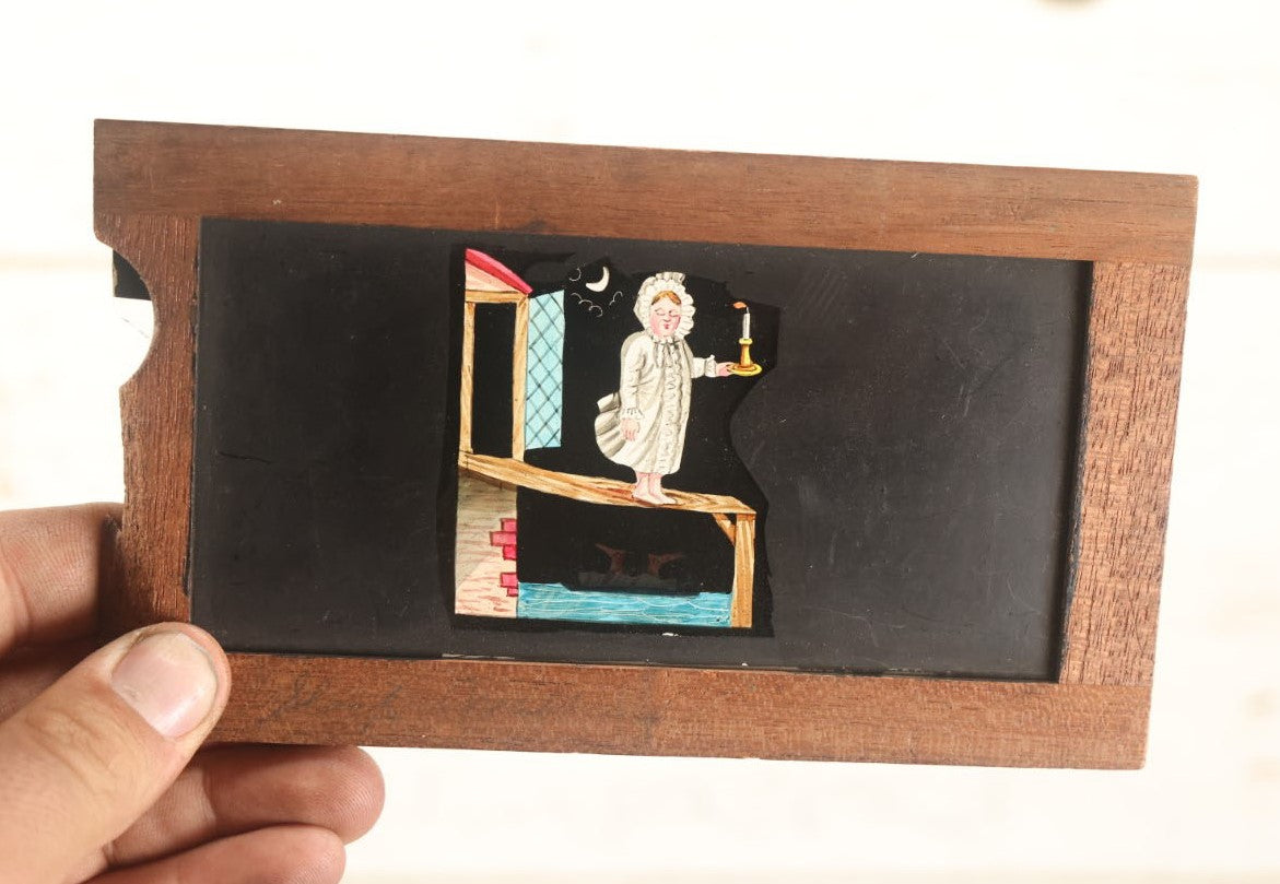 Lot 012 - Antique Animated Hand Painted Magic Lantern Slide Of Little Boy With Candle Falling In Water, Glass Slides To Change Scene