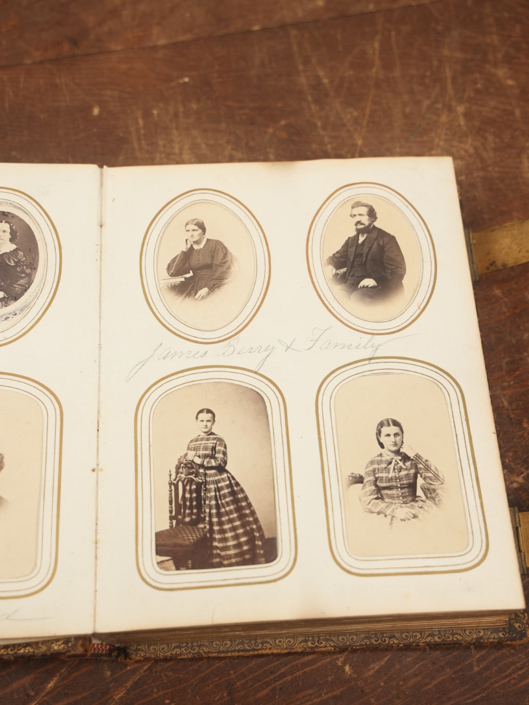 Lot 027 - Antique Family Photograph Album With 36 C.D.V. Photos, 9 Tintypes, And 27 Illustrated Filler Cards Of Various Scenes, Characters, Pretty Women