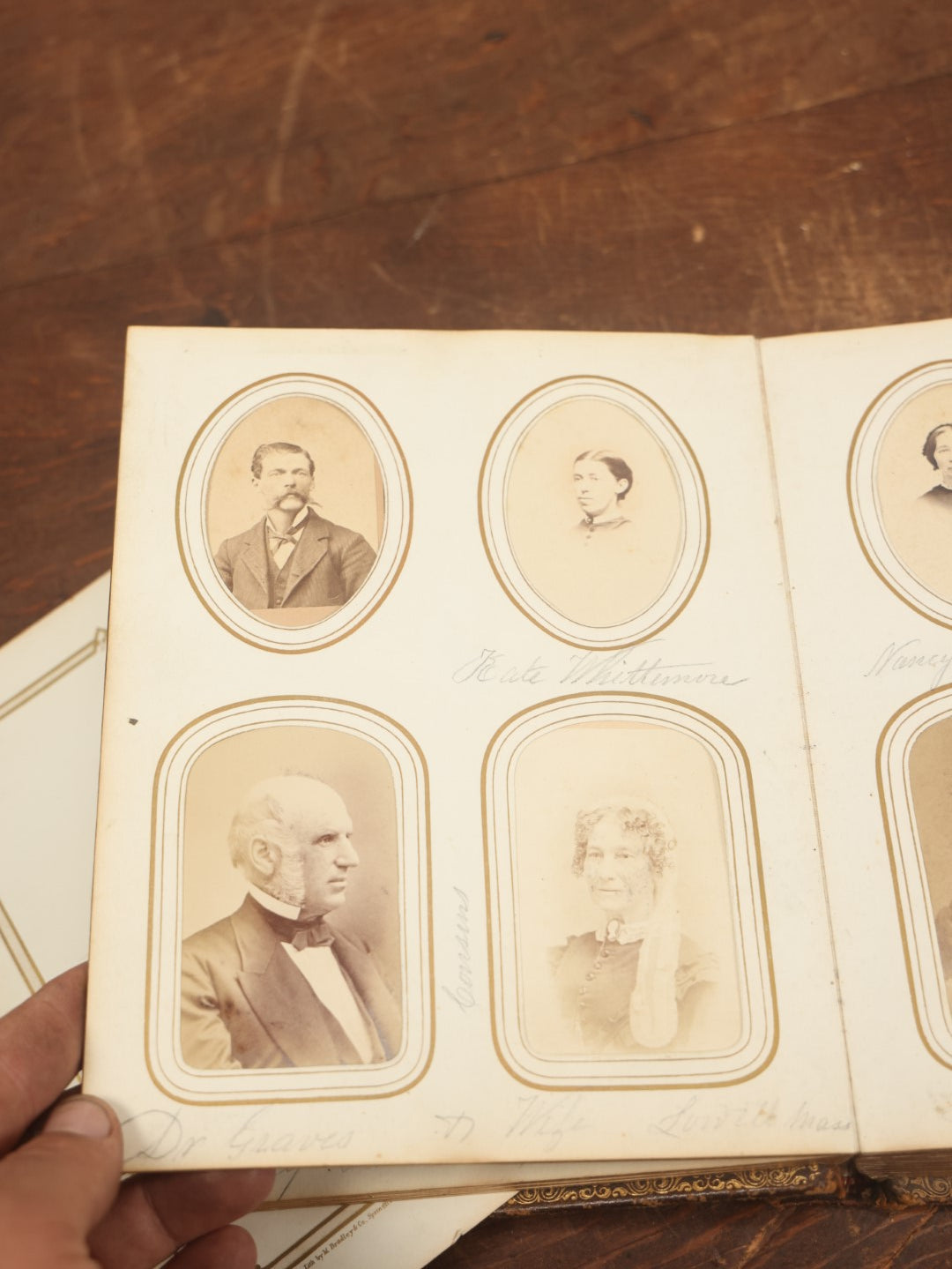 Lot 027 - Antique Family Photograph Album With 36 C.D.V. Photos, 9 Tintypes, And 27 Illustrated Filler Cards Of Various Scenes, Characters, Pretty Women