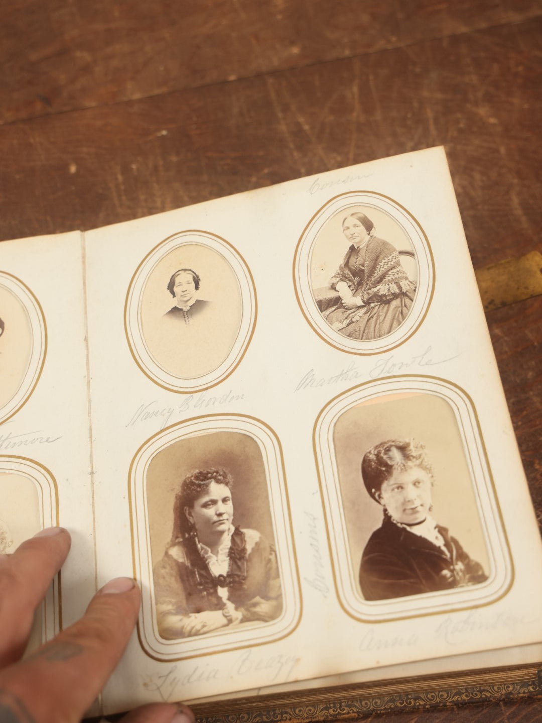 Lot 027 - Antique Family Photograph Album With 36 C.D.V. Photos, 9 Tintypes, And 27 Illustrated Filler Cards Of Various Scenes, Characters, Pretty Women