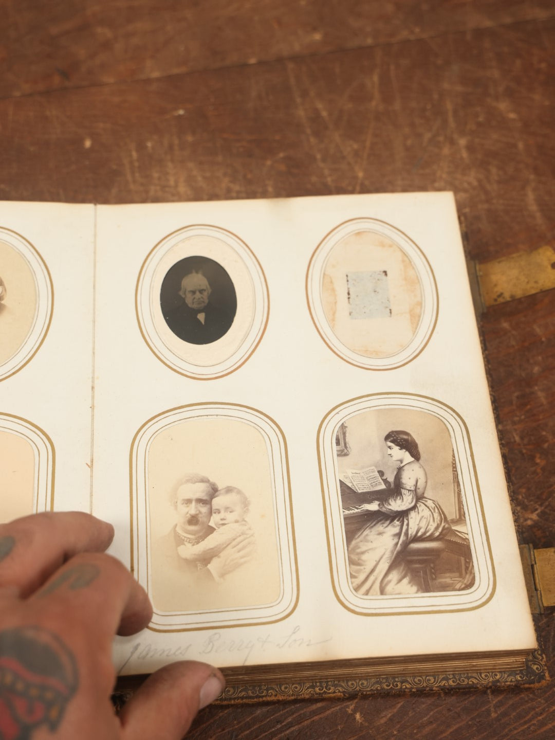 Lot 027 - Antique Family Photograph Album With 36 C.D.V. Photos, 9 Tintypes, And 27 Illustrated Filler Cards Of Various Scenes, Characters, Pretty Women