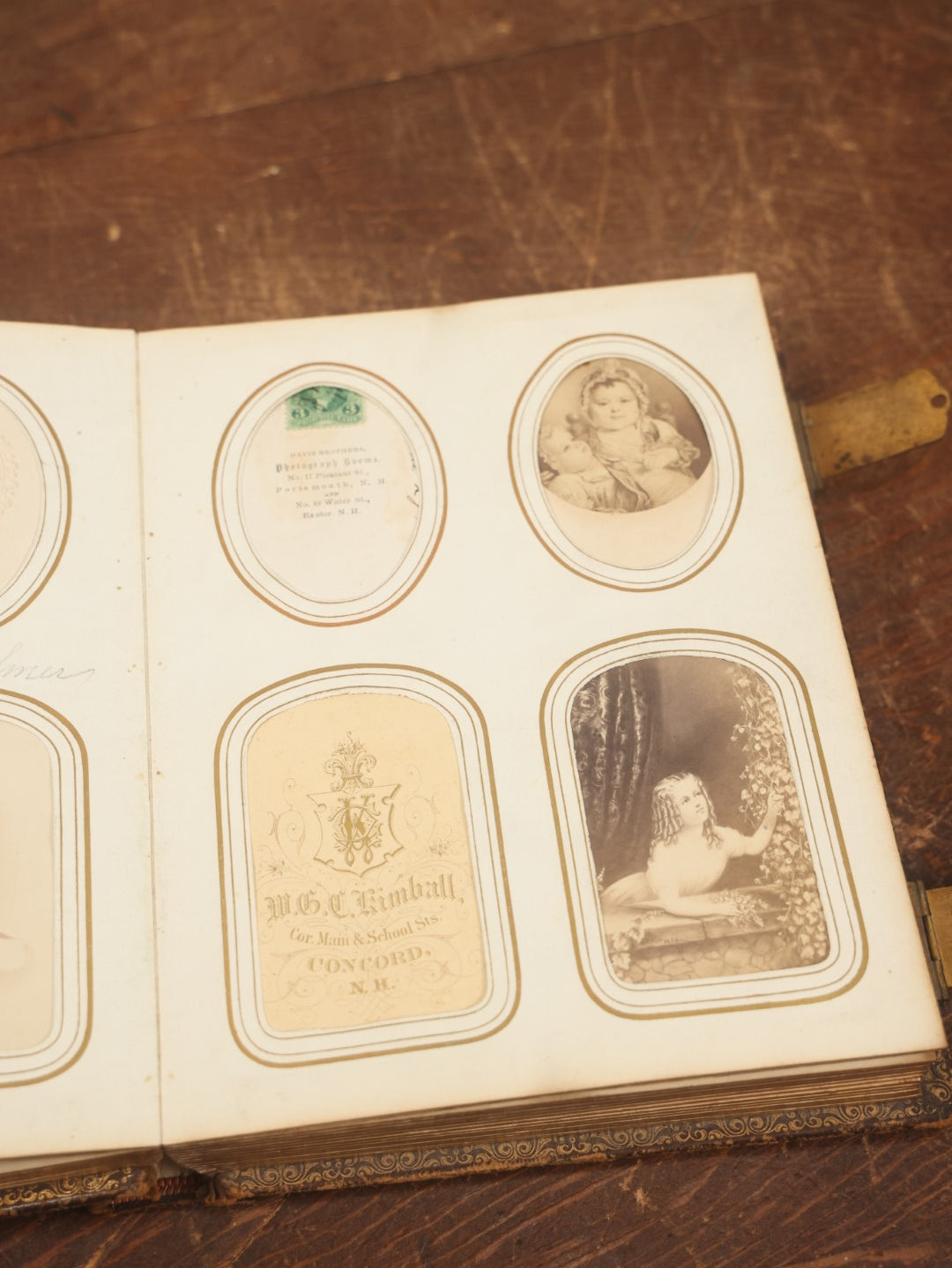 Lot 027 - Antique Family Photograph Album With 36 C.D.V. Photos, 9 Tintypes, And 27 Illustrated Filler Cards Of Various Scenes, Characters, Pretty Women