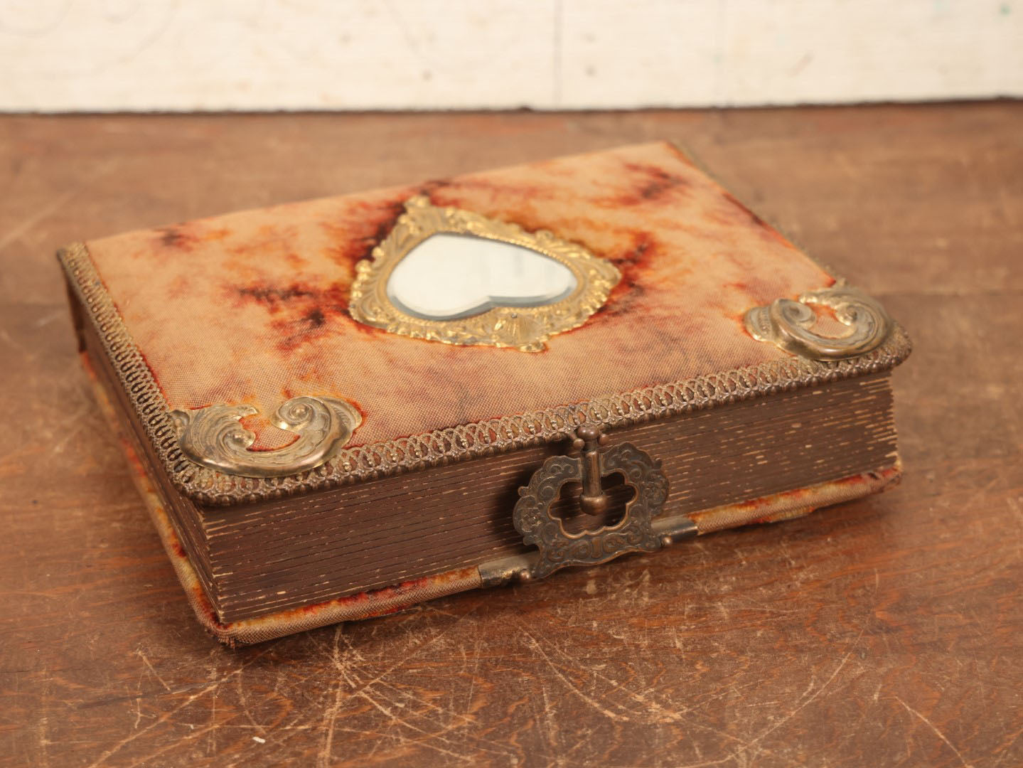 Lot 028 - Antique Family Photograph Album With Velvet Covering And Beveled Glass Heart Mirror, Containing 34 Cabinet Card Photos, 10 C.D.V.S, 1 Tintype, And 23 Paper Portrait Snapshots