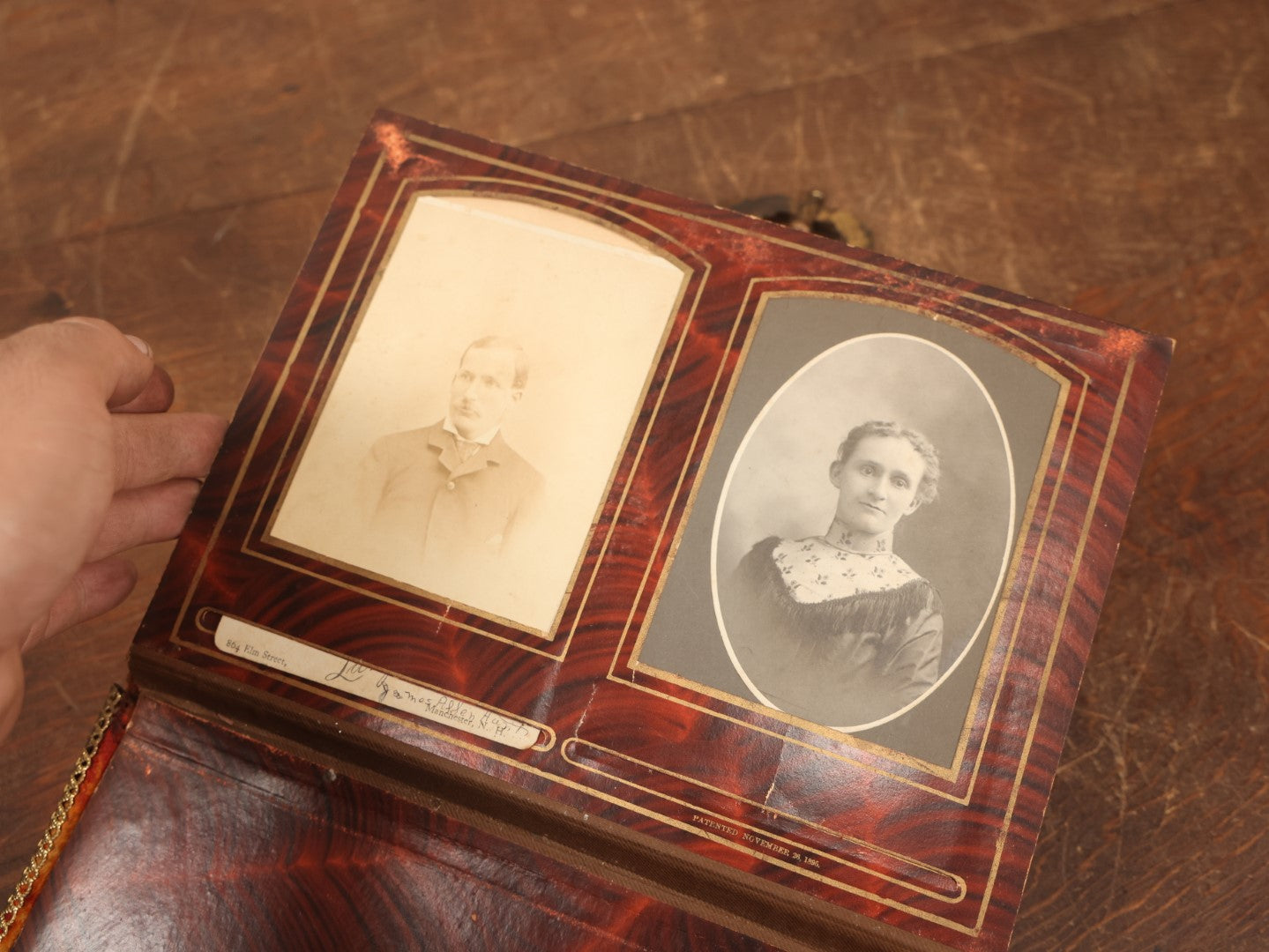 Lot 028 - Antique Family Photograph Album With Velvet Covering And Beveled Glass Heart Mirror, Containing 34 Cabinet Card Photos, 10 C.D.V.S, 1 Tintype, And 23 Paper Portrait Snapshots