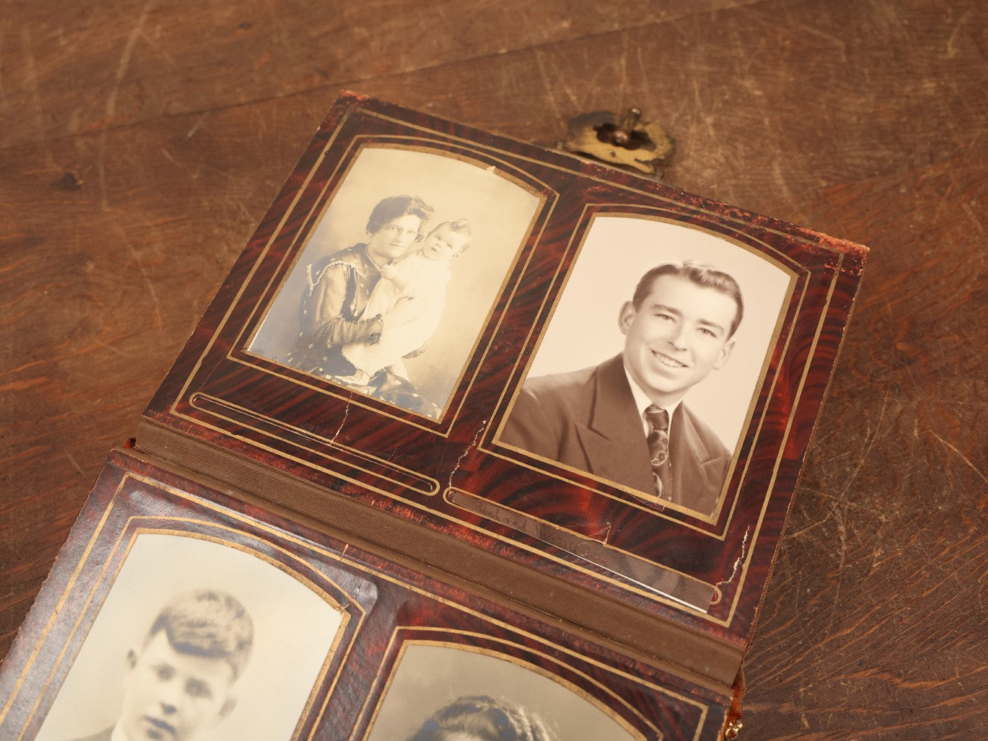 Lot 028 - Antique Family Photograph Album With Velvet Covering And Beveled Glass Heart Mirror, Containing 34 Cabinet Card Photos, 10 C.D.V.S, 1 Tintype, And 23 Paper Portrait Snapshots