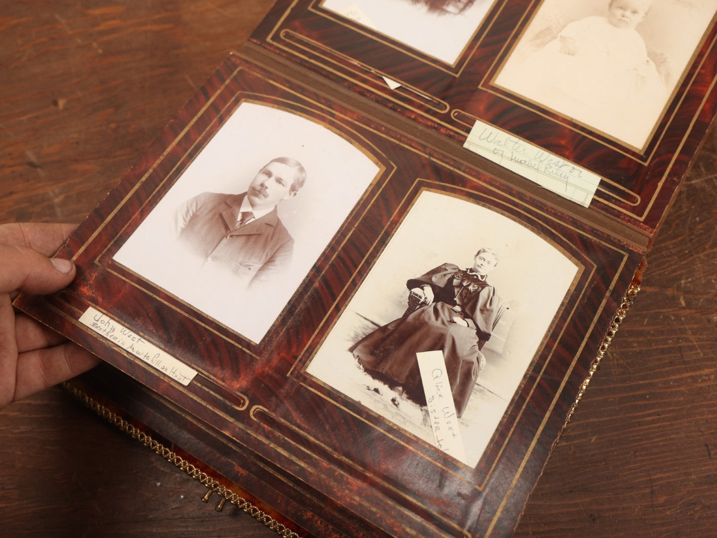 Lot 028 - Antique Family Photograph Album With Velvet Covering And Beveled Glass Heart Mirror, Containing 34 Cabinet Card Photos, 10 C.D.V.S, 1 Tintype, And 23 Paper Portrait Snapshots