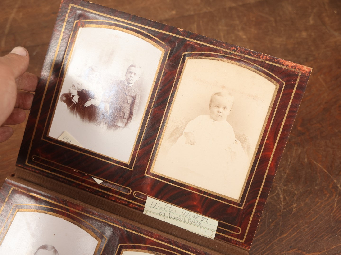 Lot 028 - Antique Family Photograph Album With Velvet Covering And Beveled Glass Heart Mirror, Containing 34 Cabinet Card Photos, 10 C.D.V.S, 1 Tintype, And 23 Paper Portrait Snapshots