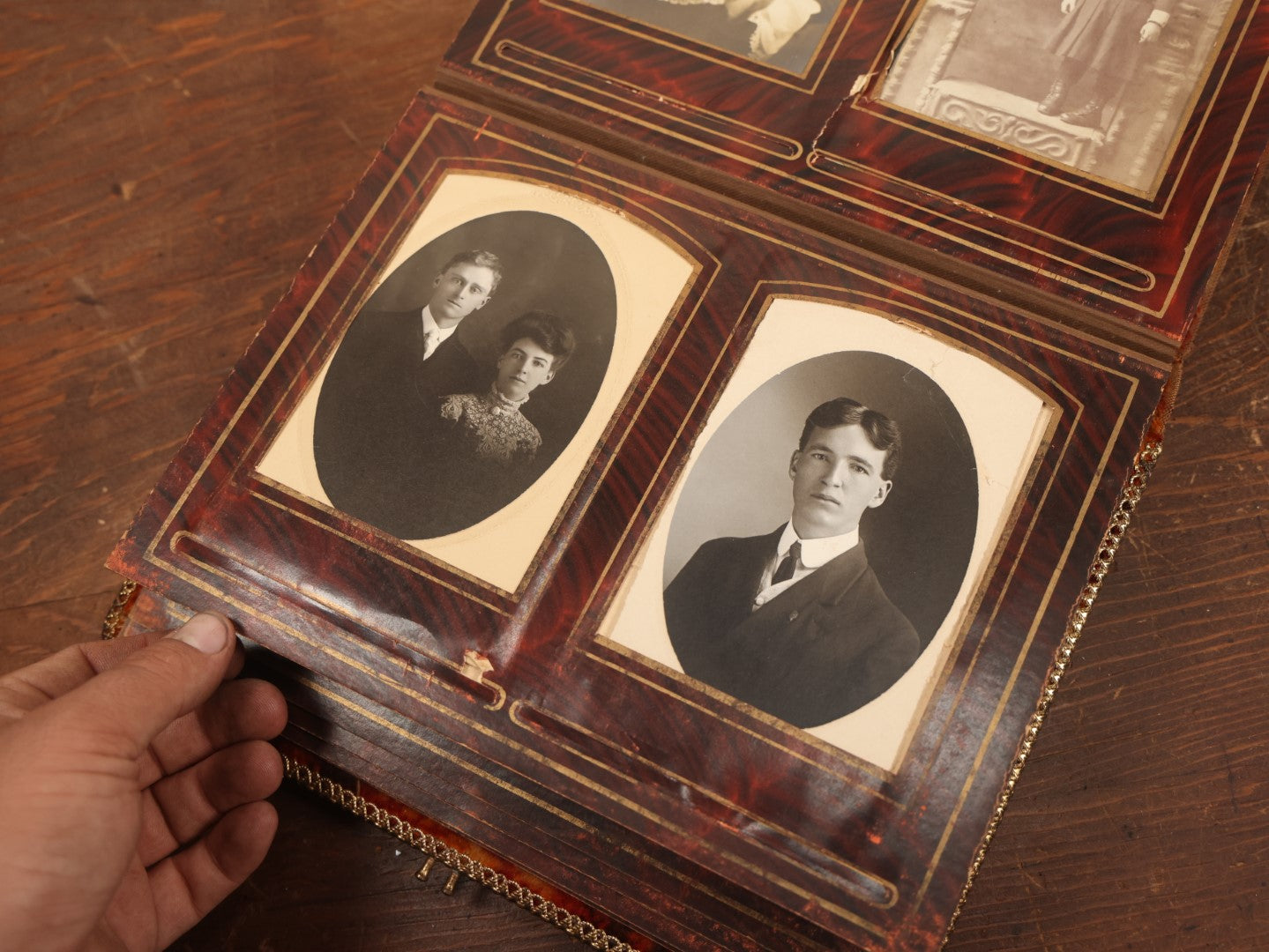 Lot 028 - Antique Family Photograph Album With Velvet Covering And Beveled Glass Heart Mirror, Containing 34 Cabinet Card Photos, 10 C.D.V.S, 1 Tintype, And 23 Paper Portrait Snapshots